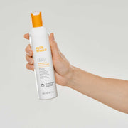 milk-shake-daily-conditioner-in-hand